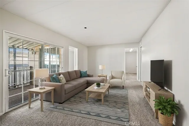 a spacious bathroom with a granite countertop sink toilet and a mirror