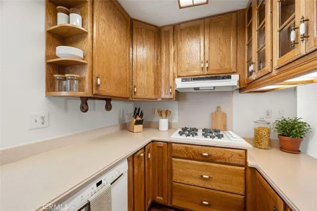 a spacious bedroom with a bed and a window