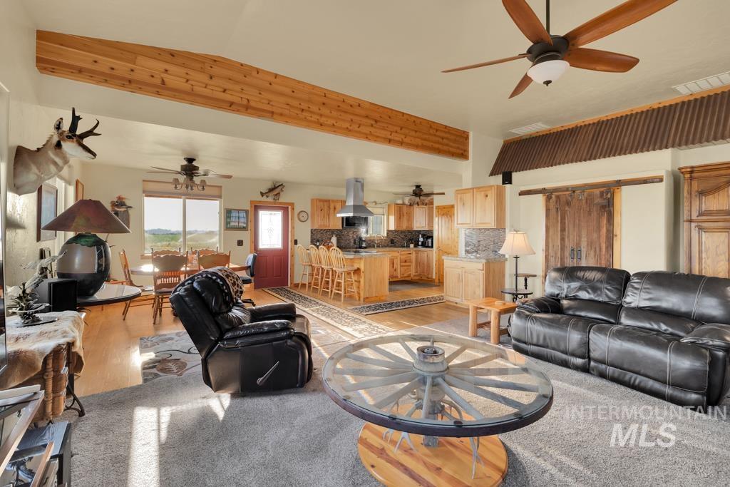 2530 4000 North Filer, ID 83328 - Photo 12 of 48 Living area featuring light wood-style flooring and a ceiling fan