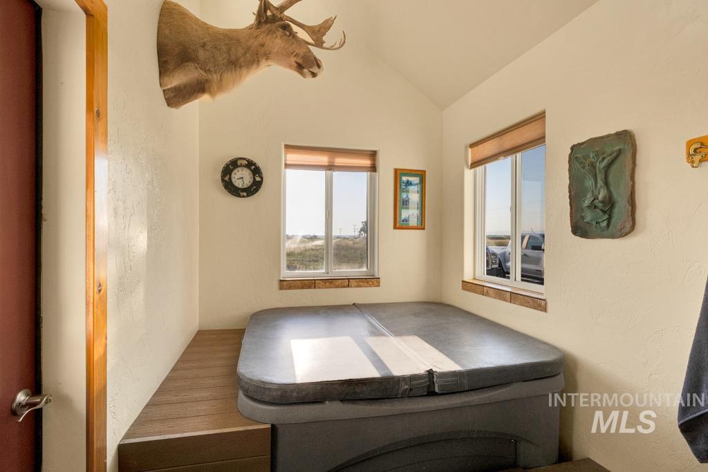 2530 4000 North Filer, ID 83328 - Photo 24 of 48 Interior space featuring a jacuzzi, vaulted ceiling, and healthy amount of natural light