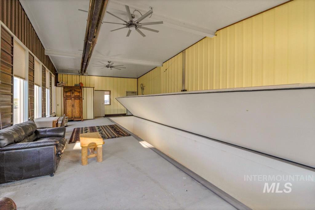 2530 4000 North Filer, ID 83328 - Photo 29 of 48 Below grade area with a ceiling fan and wooden walls