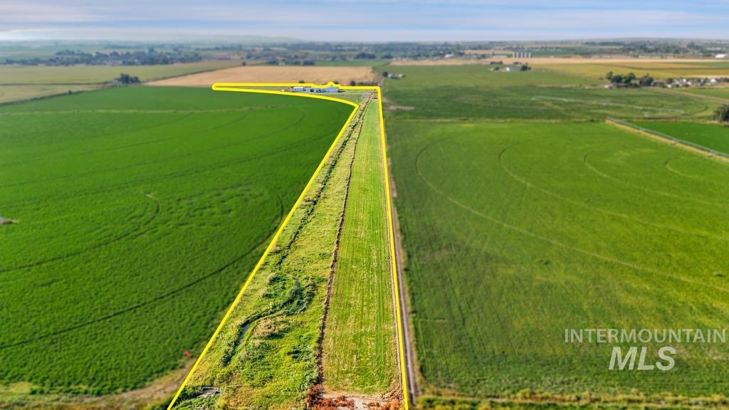 2530 4000 North Filer, ID 83328 - Photo 42 of 48 Aerial view of sparsely populated area featuring rows of crops