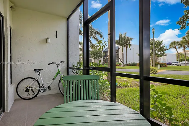 a view of a two chairs on the deck