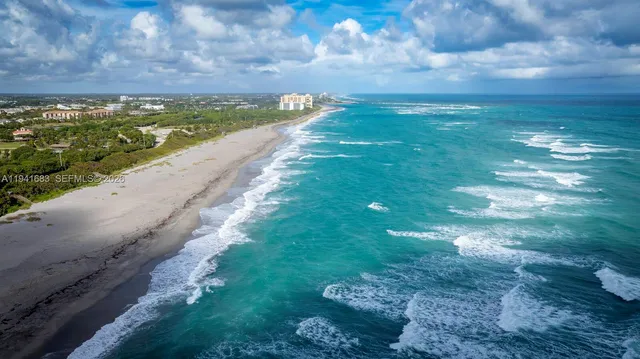 a view of a lake with a big yard