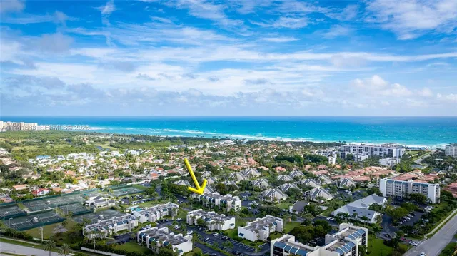 a view of a city with an ocean