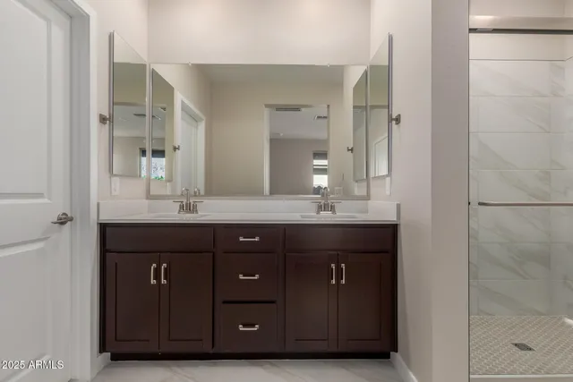 a bathroom with a vanity and a sink