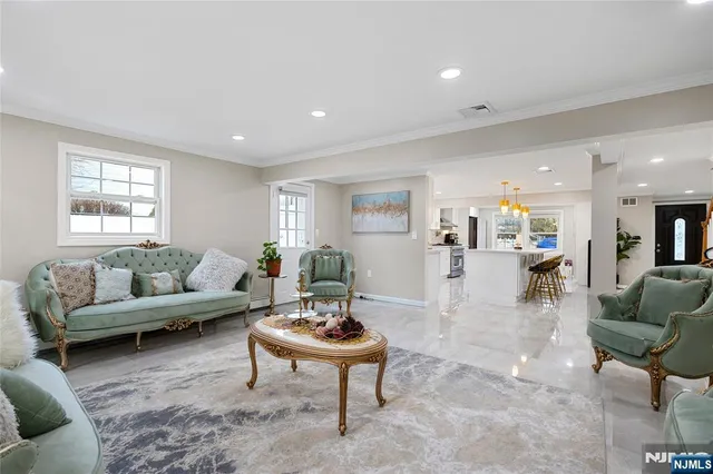 a living room with furniture and a table