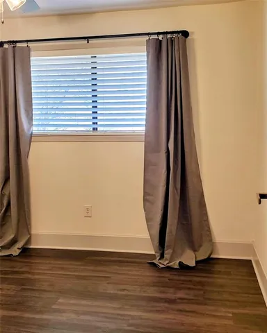 a bathroom with a sink mirror toilet and vanity