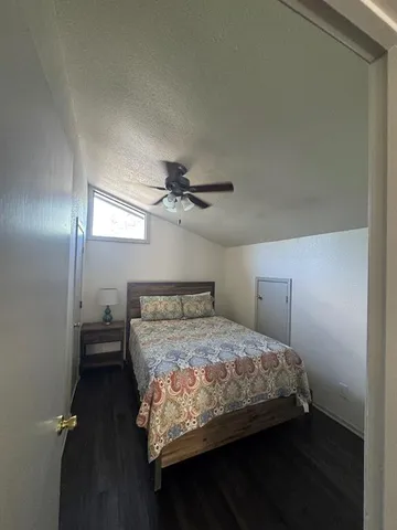 a bathroom with a sink toilet and a mirror