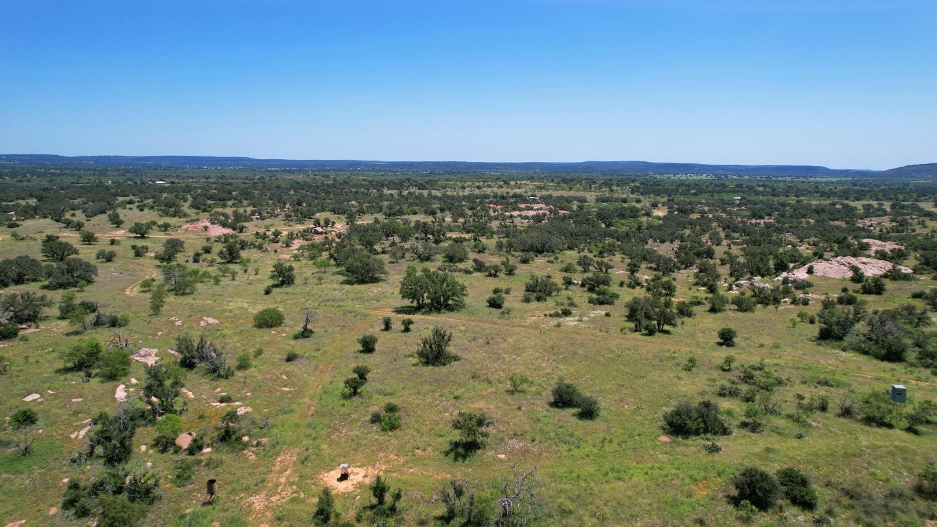 61 Acres Road Pontotoc, TX 76869 - Photo 5 of 6 an aerial view of a houses with a yard