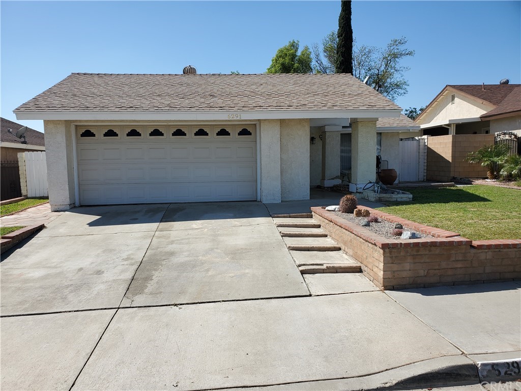 6291 Candlelight Drive Riverside, CA 92509 - Photo 1 of 1 a view of a white house with a sink and fire pit