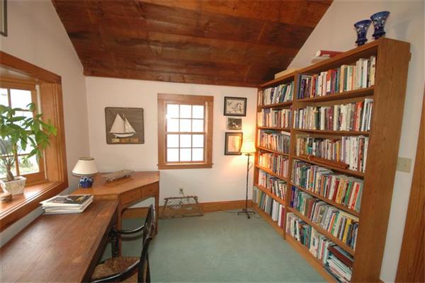 76 Holt Road Andover, MA 01810 - Photo 11 of 30 a workspace with furniture and a bookshelf