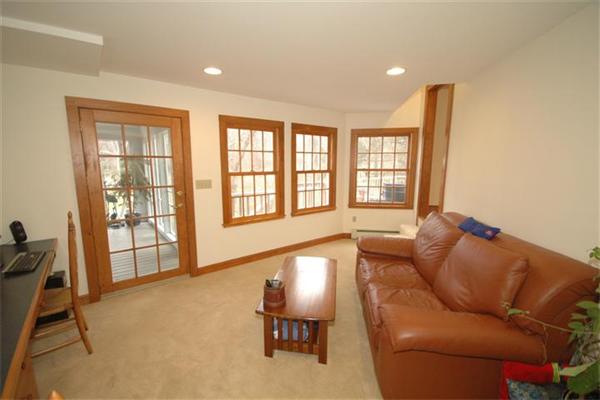 76 Holt Road Andover, MA 01810 - Photo 13 of 30 a living room with furniture and floor to ceiling windows