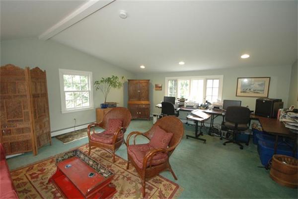 76 Holt Road Andover, MA 01810 - Photo 15 of 30 a living room with furniture a window and a table