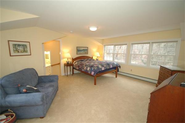 76 Holt Road Andover, MA 01810 - Photo 16 of 30 a bedroom with furniture and a window