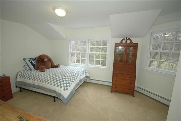 76 Holt Road Andover, MA 01810 - Photo 19 of 30 a bedroom with a bed and a window