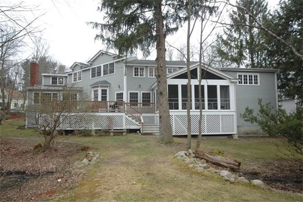 76 Holt Road Andover, MA 01810 - Photo 25 of 30 a front view of a house with a yard
