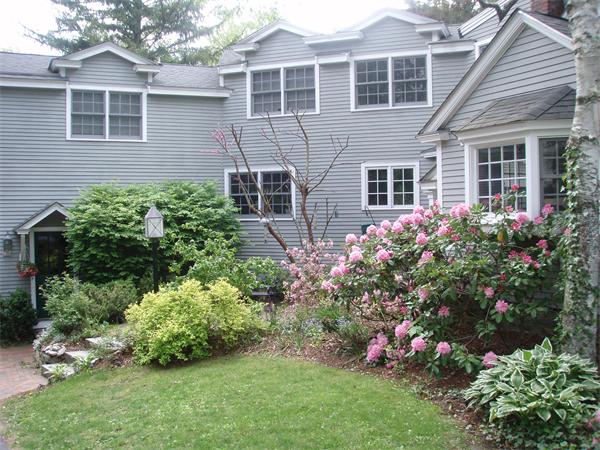 76 Holt Road Andover, MA 01810 - Photo 26 of 30 front view of a house with a yard