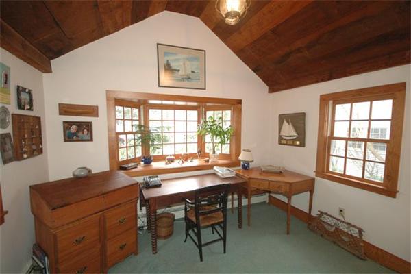 76 Holt Road Andover, MA 01810 - Photo 10 of 30 a view of a workspace with a window and dining table in a room