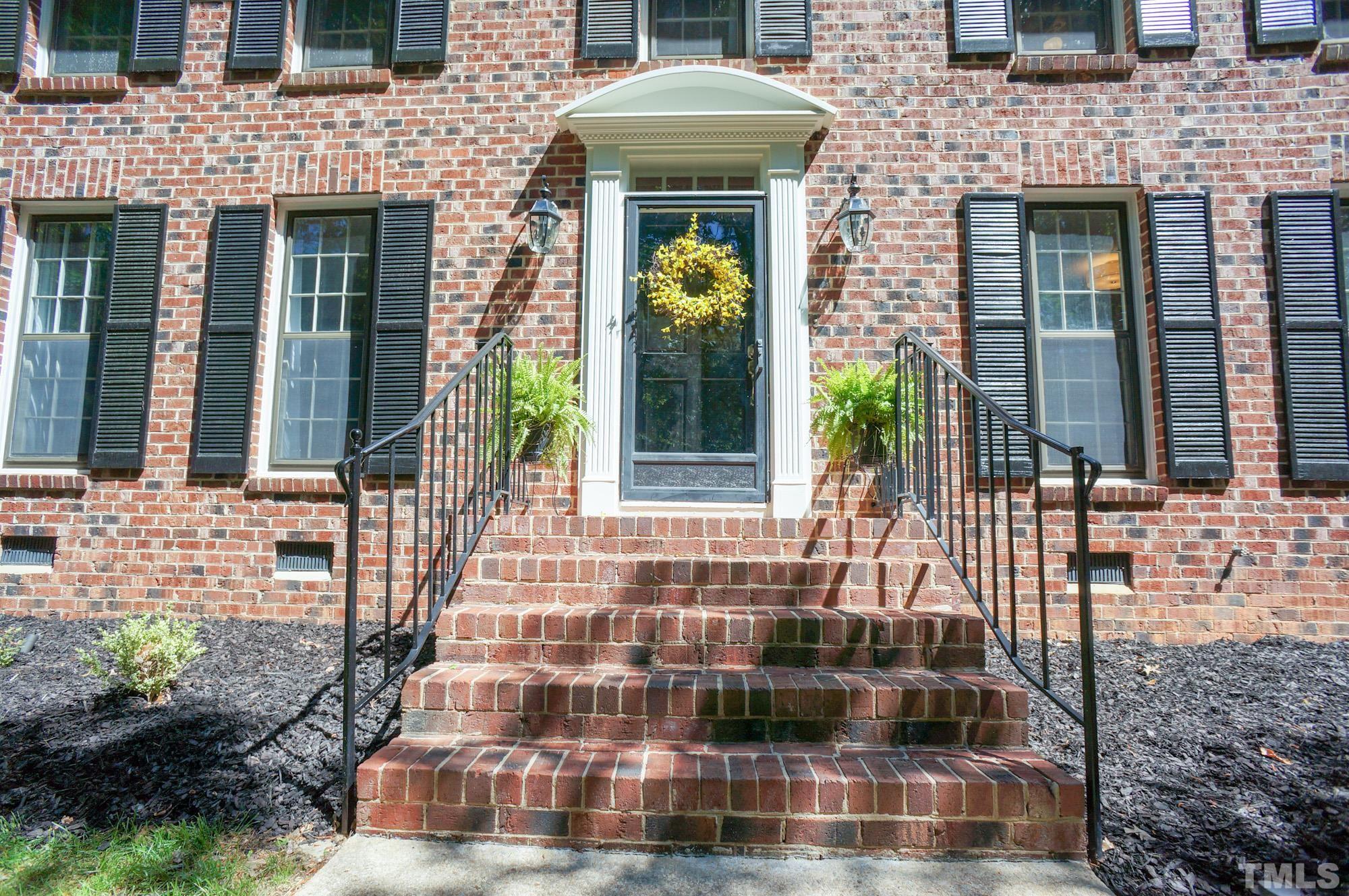 408 Emerywood Drive Raleigh, NC 27615 - Photo 2 of 44 a front view of a house