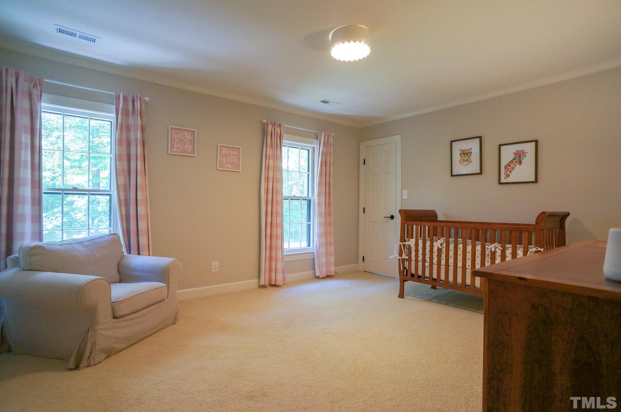 408 Emerywood Drive Raleigh, NC 27615 - Photo 24 of 44 a living room with furniture and window