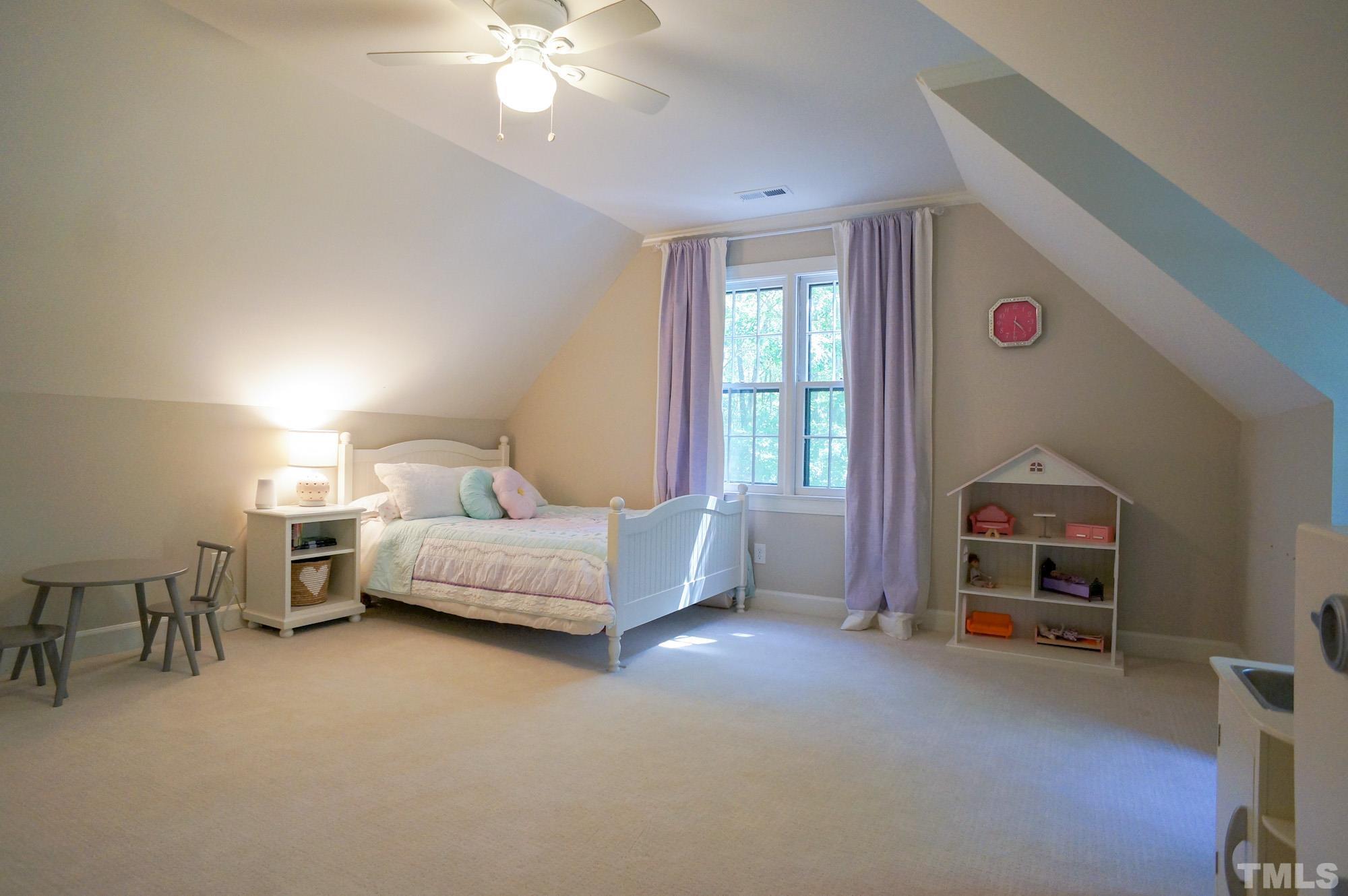 408 Emerywood Drive Raleigh, NC 27615 - Photo 31 of 44 a bedroom with furniture and a window
