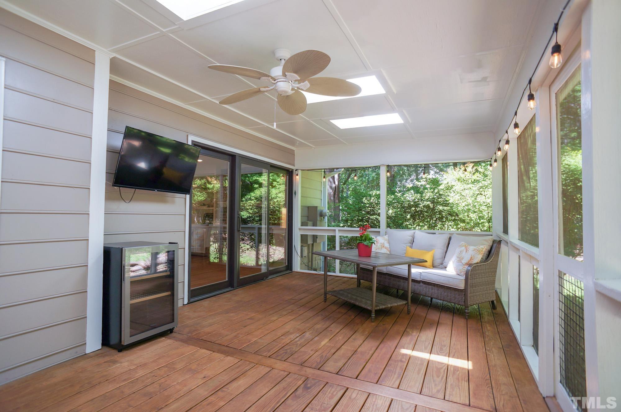 408 Emerywood Drive Raleigh, NC 27615 - Photo 36 of 44 a living room with furniture and a fireplace