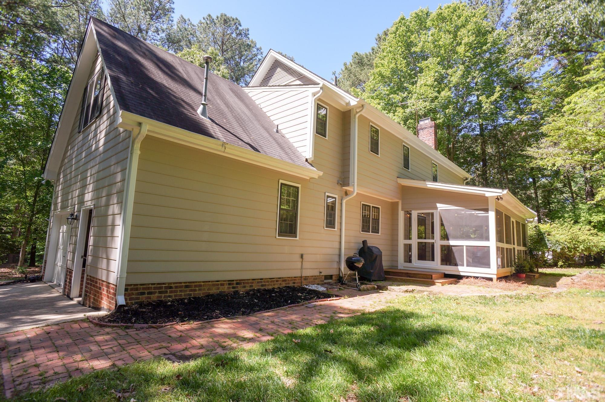 408 Emerywood Drive Raleigh, NC 27615 - Photo 41 of 44 a view of a house with backyard and sitting area