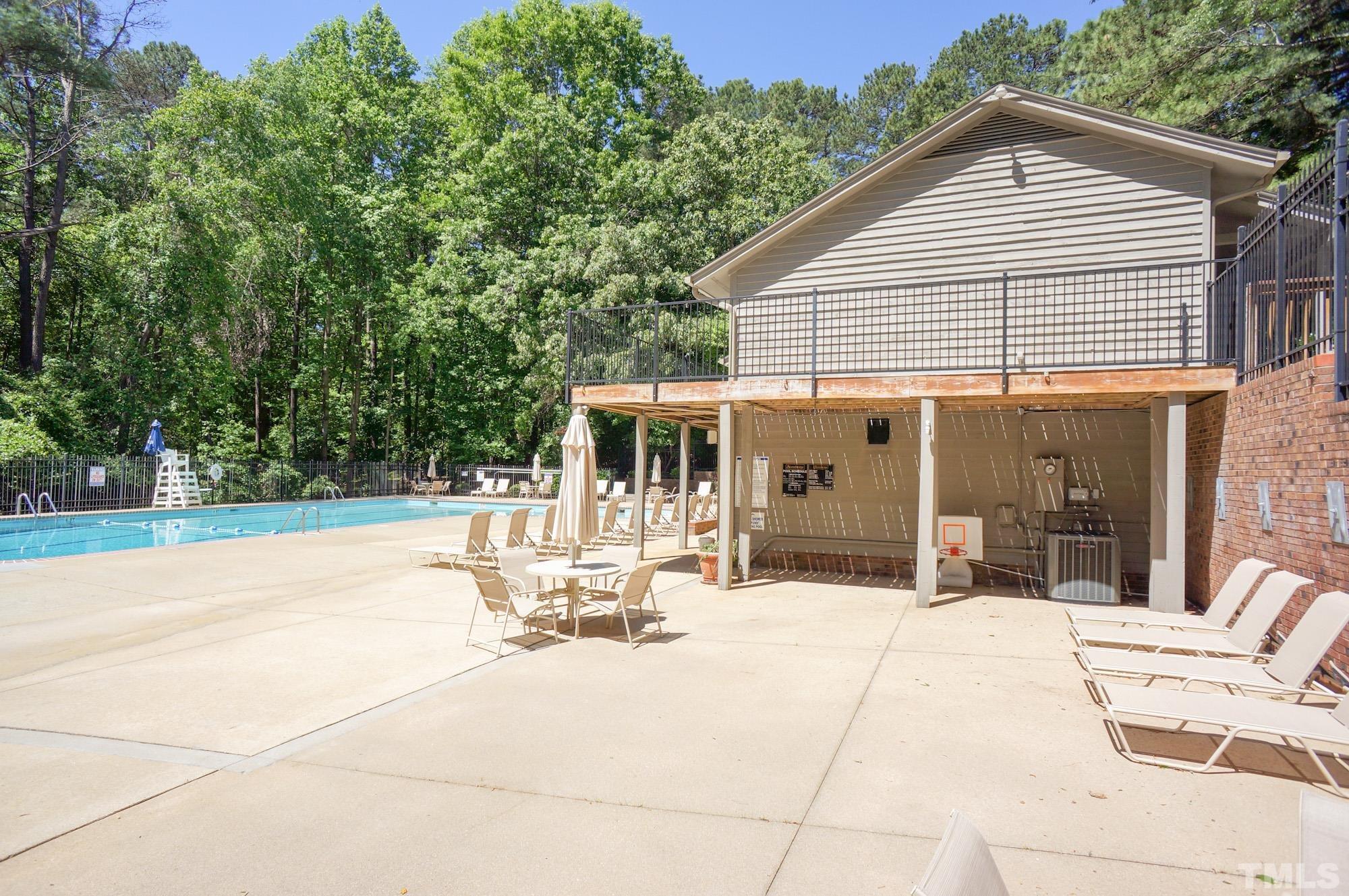 408 Emerywood Drive Raleigh, NC 27615 - Photo 43 of 44 a house view with sitting space and garden space