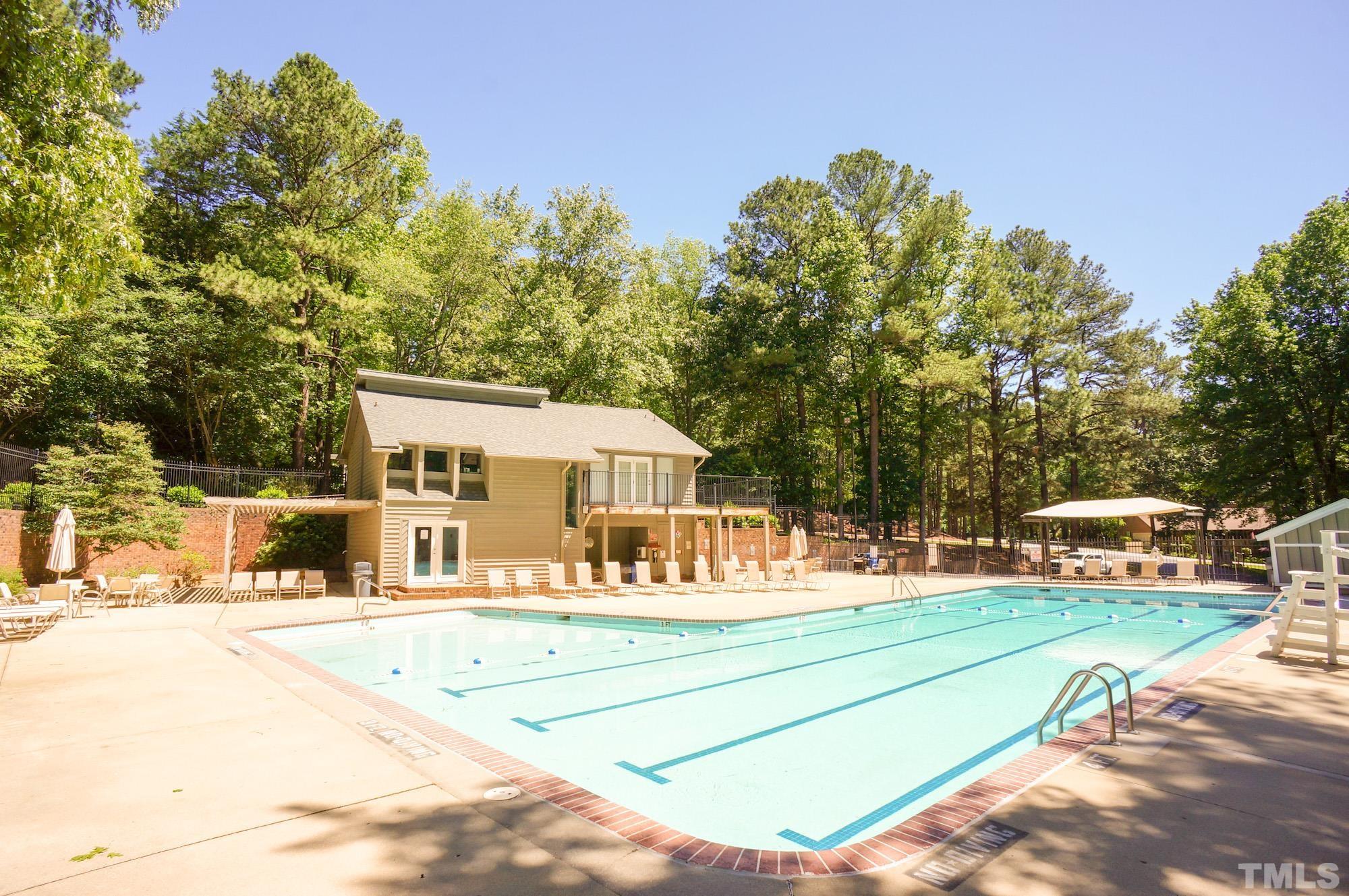 408 Emerywood Drive Raleigh, NC 27615 - Photo 44 of 44 a view of a house with a big yard and large trees