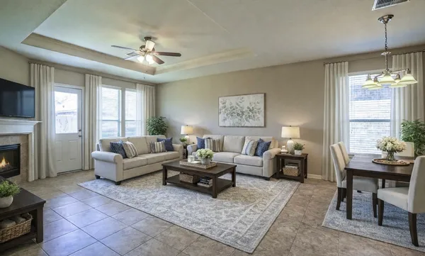 a living room with furniture fireplace and window