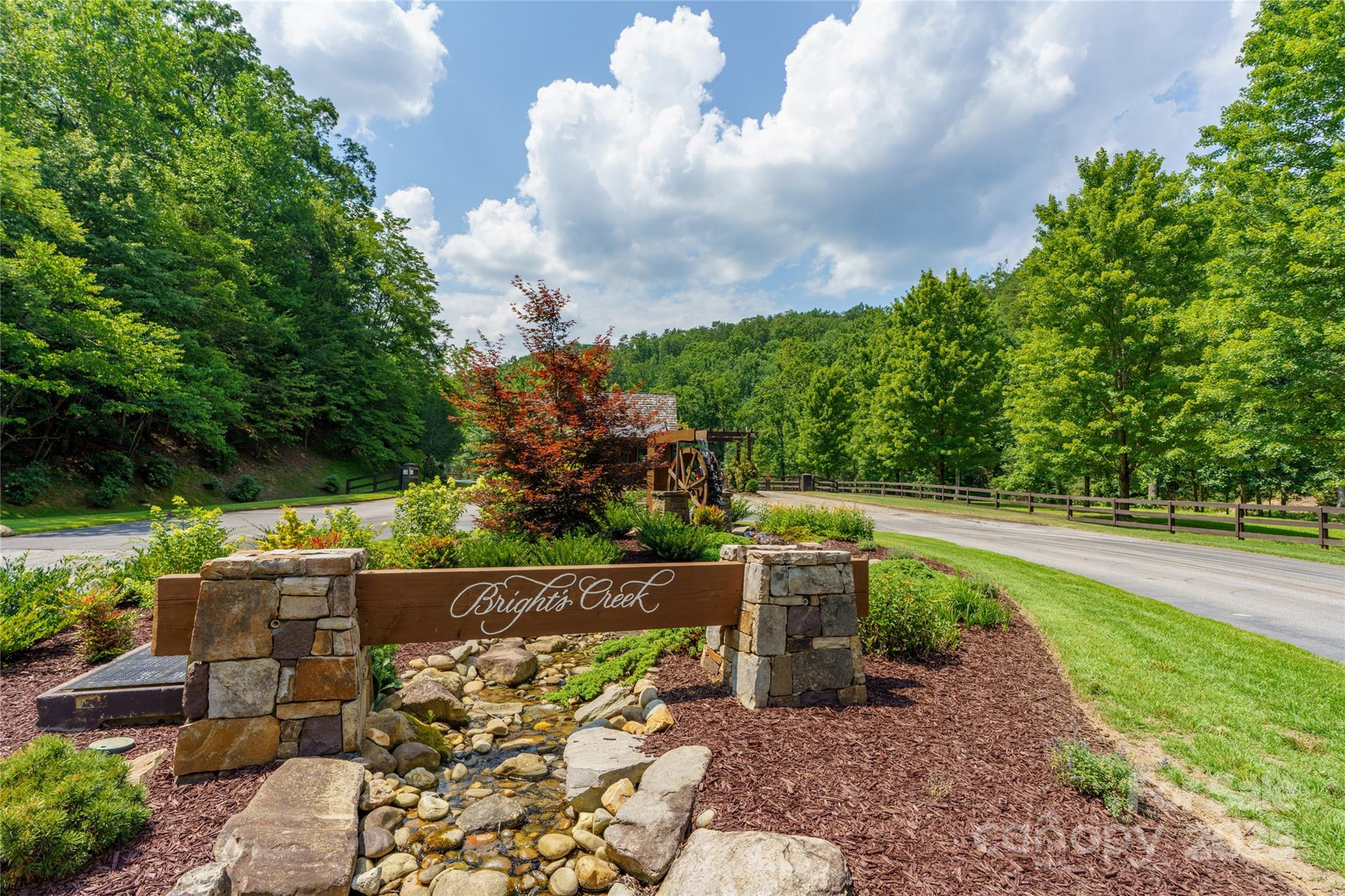 Lot 256 Haddington Dr Mill Spring West Mill Spring, NC 28756 - Photo 20 of 22 a view of a garden with an outdoor seating