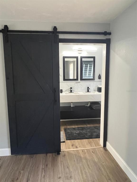 905 West 11th Avenue Mount Dora, FL 32757 - Photo 16 of 25 a bathroom with a sink and a mirror