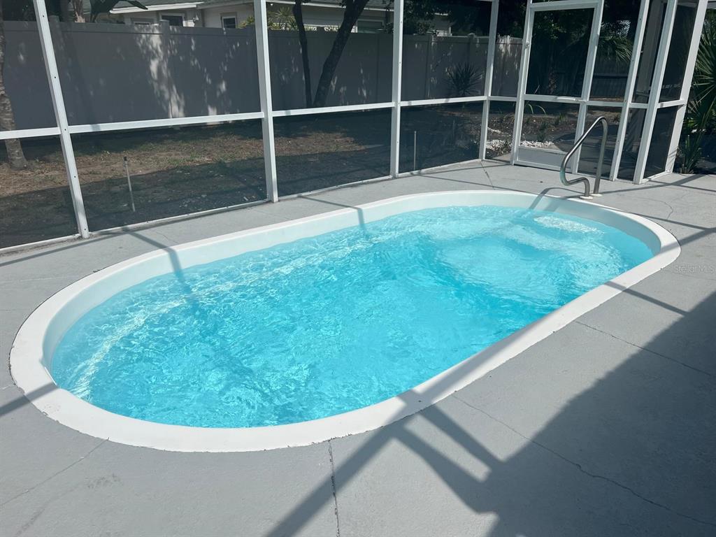 905 West 11th Avenue Mount Dora, FL 32757 - Photo 25 of 25 a view of swimming pool from a living room