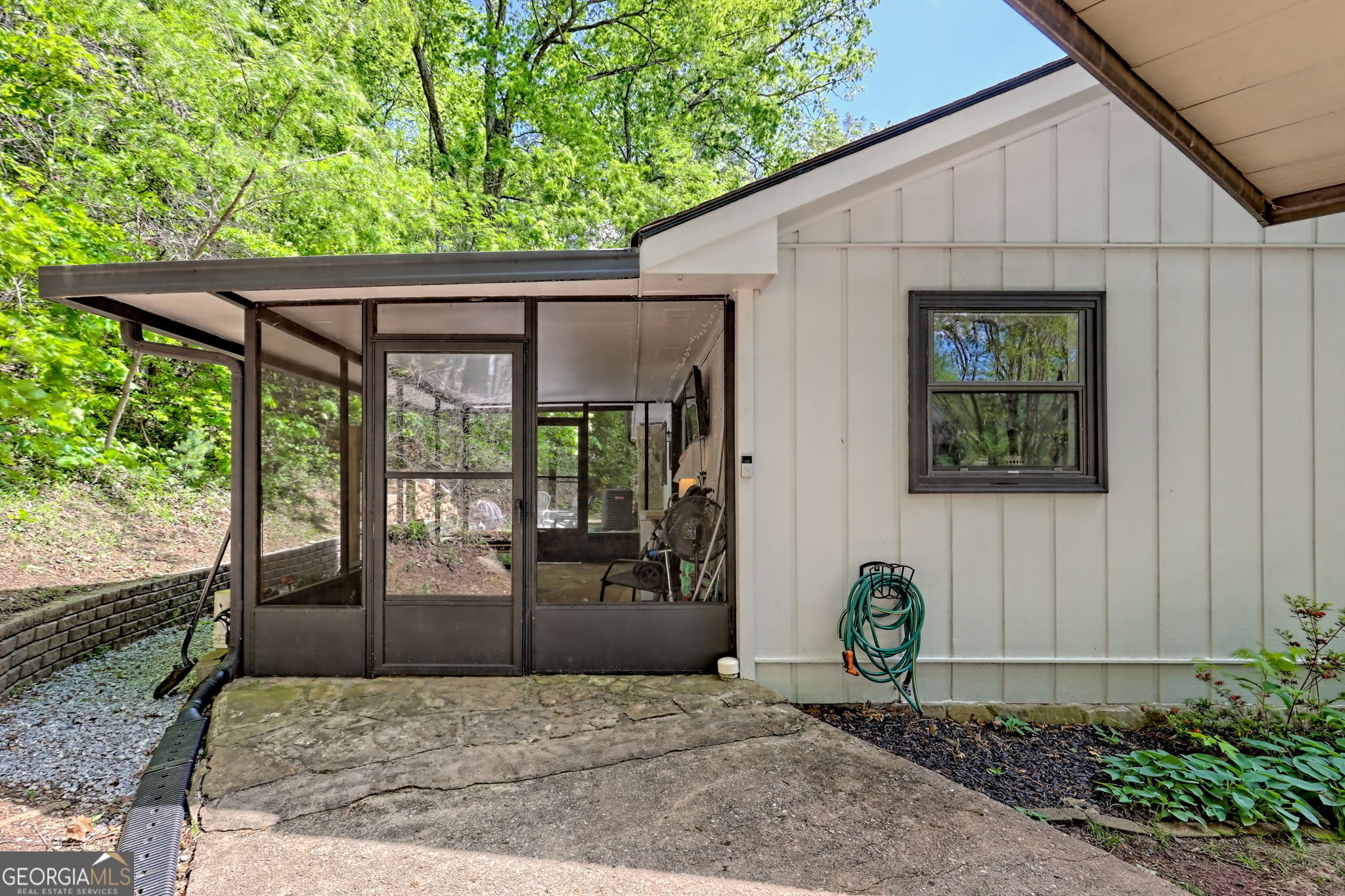 a view of front door and yard