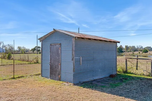 a house view with a backyard space
