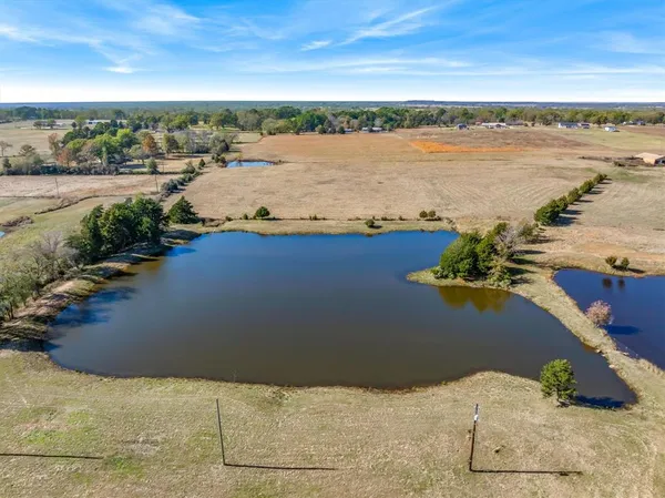 a view of an ocean and city