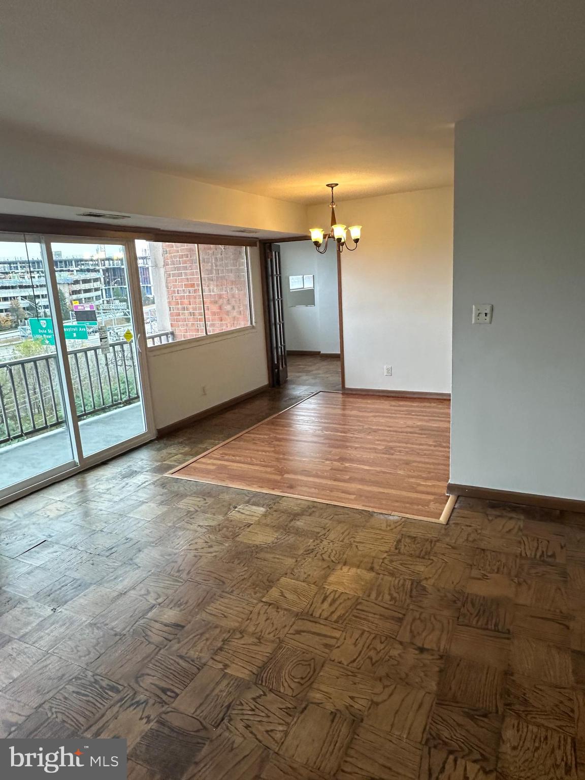 5801 Quantrell Avenue, Unit 407 Alexandria, VA 22312 - Photo 11 of 14 a view of an empty room with window
