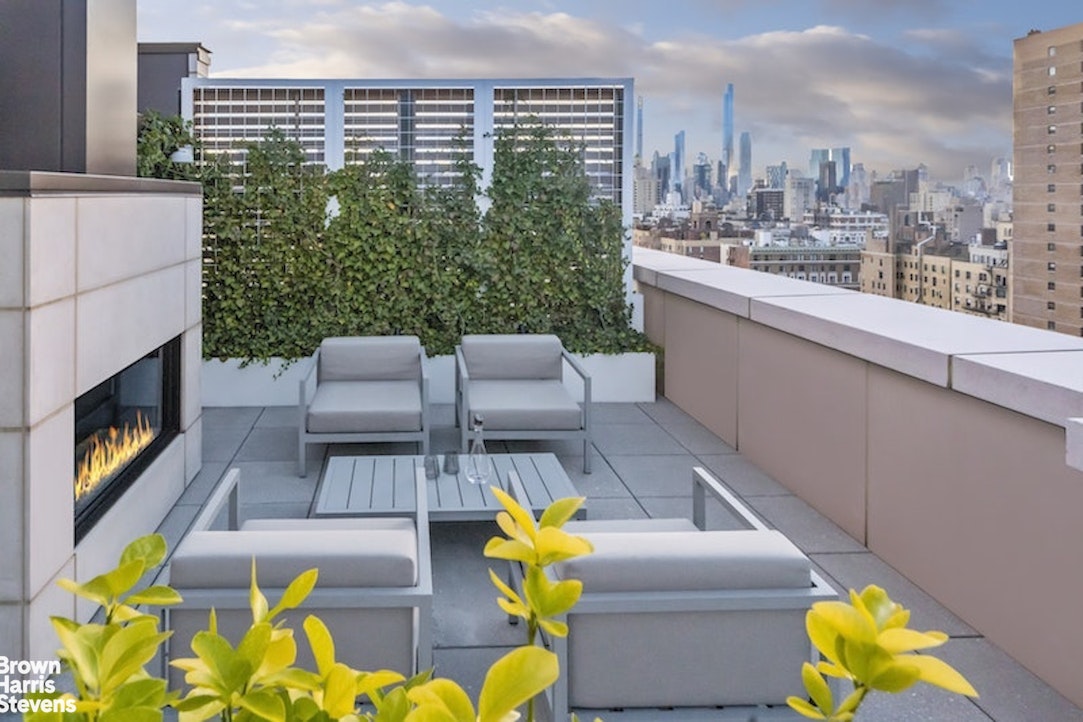 1289 Lexington Avenue, Unit 18C Manhattan, NY 10028 - Photo 13 of 20 a view of sitting area with furniture and fire pit