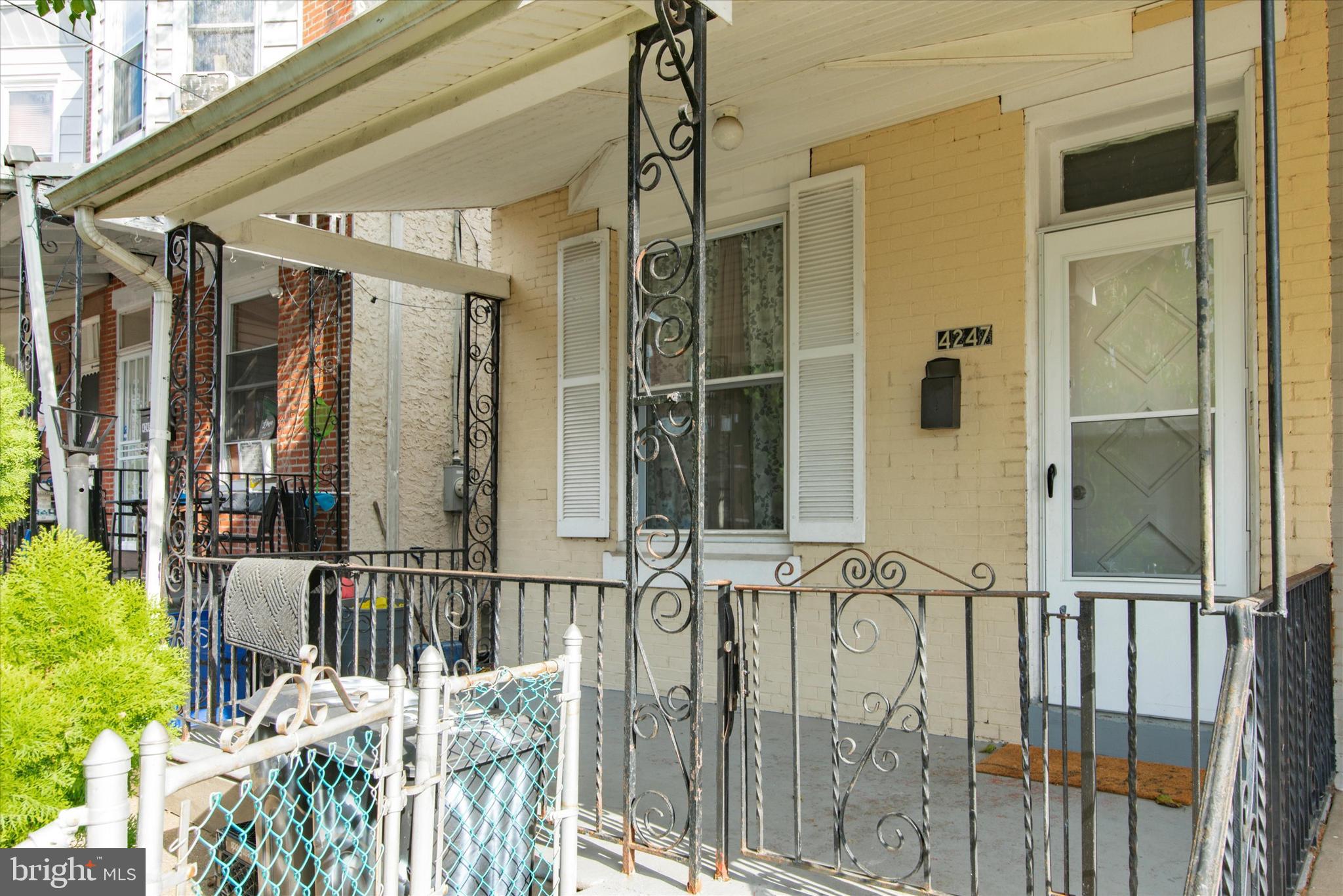 4247 Romain Street Philadelphia, PA 19124 - Photo 1 of 1 a view of a house with wooden fence