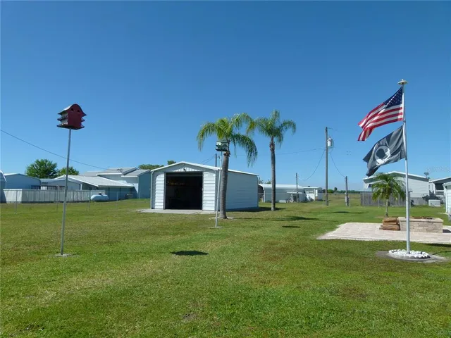 a house with a garden and a bench