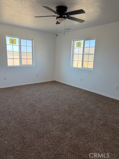 16925 Nanticoke Road Apple Valley, CA 92307 - Photo 15 of 87 a view of an empty room with a window