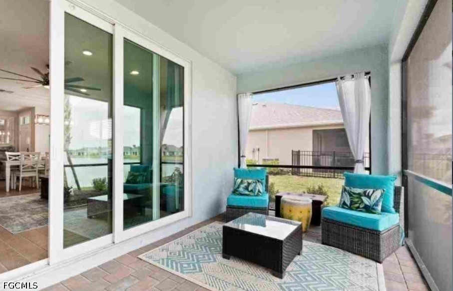 17799 Oleander Avenue Punta Gorda, FL 33982 - Photo 13 of 19 a living room with furniture and a large window