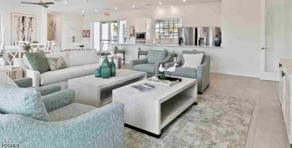 a living room with furniture and a table