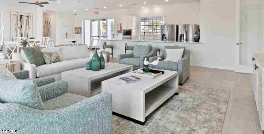 17799 Oleander Avenue Punta Gorda, FL 33982 - Photo 17 of 19 a living room with furniture and a table