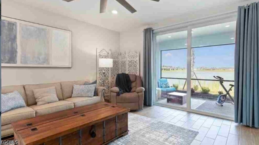17799 Oleander Avenue Punta Gorda, FL 33982 - Photo 5 of 19 a living room with furniture and a large window