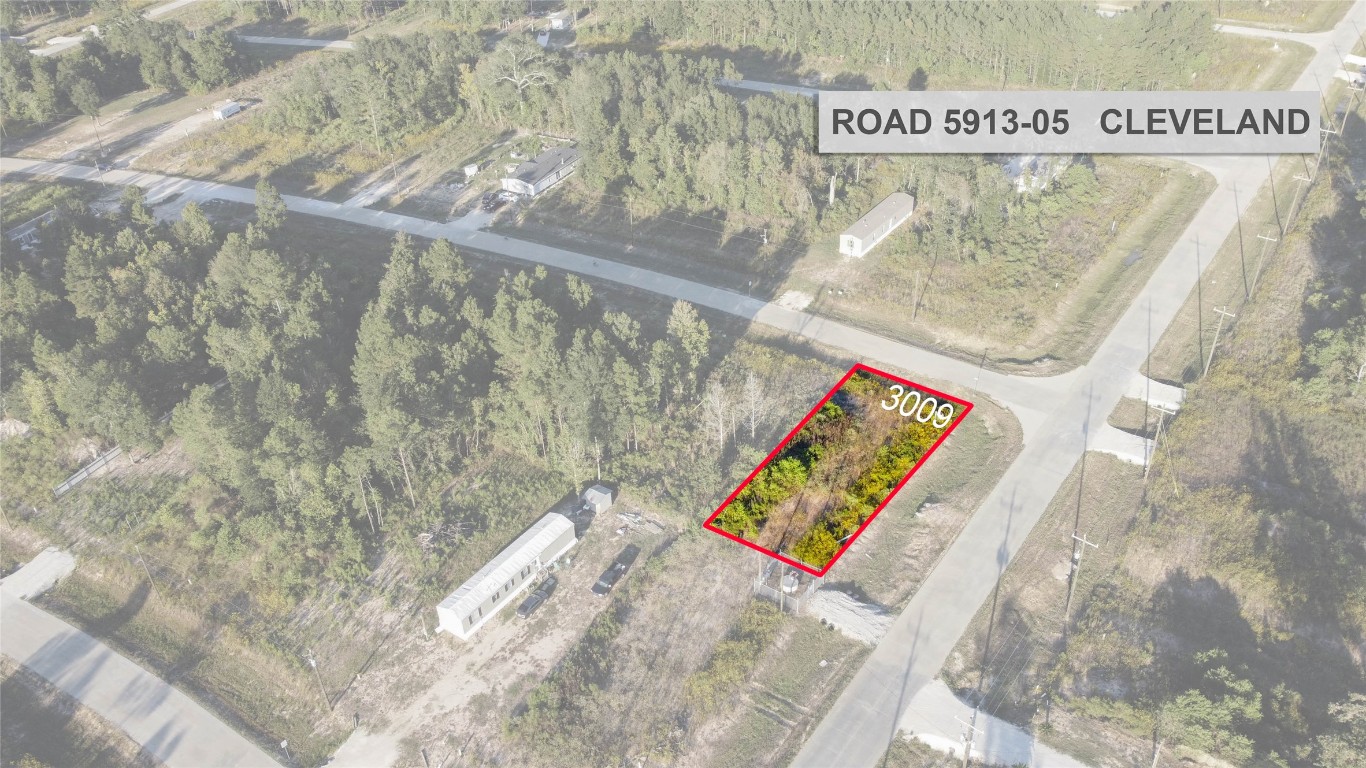 3009 Road 5913 Road, Unit 5 Cleveland, TX 77328 - Photo 2 of 6 a picture of a book in a bed