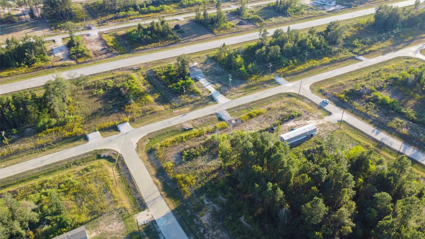 3009 Road 5913 Road, Unit 5 Cleveland, TX 77328 - Photo 4 of 6 a view of swimming pool with a yard