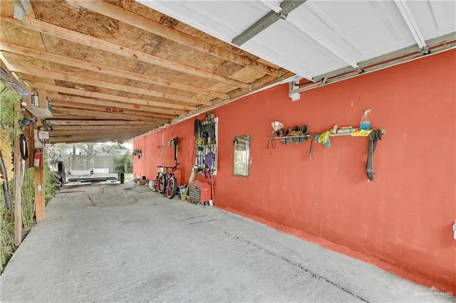 a view of a room with air conditioner duct and stairs