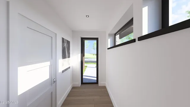 a kitchen with a stove and a refrigerator